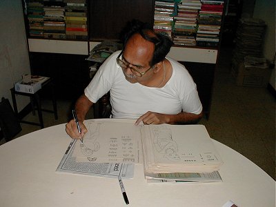 Kamat Working on an Illustration