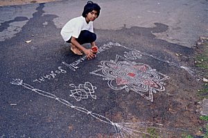 Girl Does Pongal Kolam