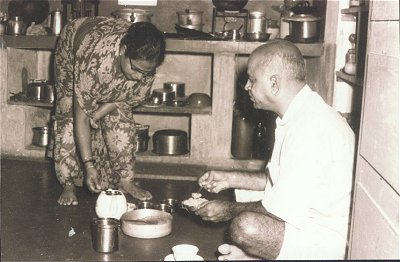 Indian Woman Serving Breakfast to Husband