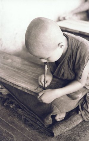 Tibetan Boy Learns to Write