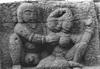 Man disturbs wife while she puts on make up<br>Ancient temple sculpture