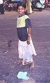 Smiling Girl Carrying Prasadam