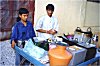 Boys Running a Roadside Eatery