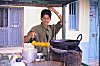 Boy Making Deep Fried Snacks