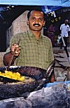 Man Preparing Fried  Dishes