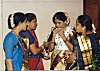 Women Assisting a Bride