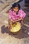 Girl Washing Plastic Vessel