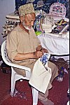Elderly Kashmiri Craftsman at Work