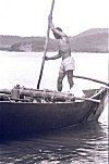 Man Navigates Hand-powered Boat