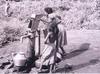 Girls Puping Water from a Well