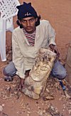 An Artist with his Carving