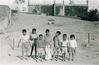 Rural Children Playing in front of a Mosque