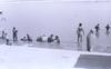 Villagers Bathing in a Lake