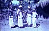 Adivasis (aboriginal natives)  in front of their housing, Madhya Pradesh