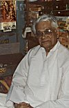 A Sethji (merchant) at his shop