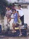 Boys Playing with an Abandoned Auto-rickshaw