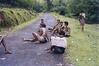 Men Relaxing on Road