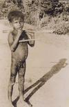 Naked Boy Playing in the Street