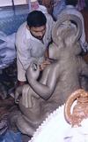 Artist Finishing up an Idol