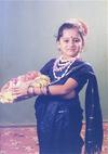 Kid in a Saree Offering Puja