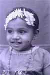 Infant with Garland of Jasmine Buds