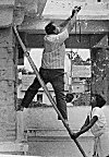 The author getting help while photographing a temple