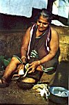 Konkani woman at work - notice her blouseless  traditional sari