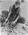 A Halakki woman peels areca-nuts(<I>supari</I>)