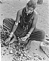 A Halakki woman peels areca-nuts(<I>supari</I>)