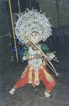 chhohu dance performer with mask