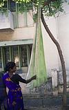 a saree craddle for construction workers child