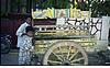 colorful cart with soda vendor
