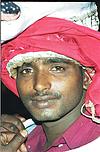 Devotee in street procession