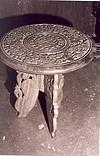 a carved wooden stool