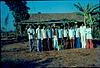 Workers in front of school building