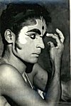 An Artist puts on Make-up for a Yakshagana Performance