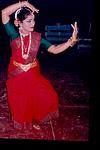 A dancer posing as putting bindi
