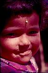 A smiling nepali baby girl