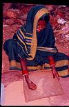 Construction worker cleaning grains