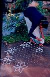 young Women at rangoli