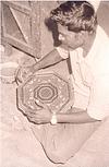 A boy preparing god chair kinhal art 1992