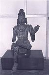 A wooden statue of a watchman of the palace