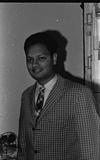 Arun Acharya in suit