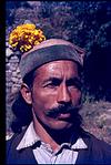 A villager from himachal Pradesh with flower