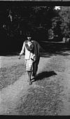 A man hurrying to puja place