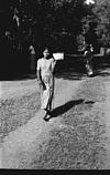 A man carrying a small basket