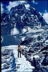 A lone mountain trekker in mountain gorge