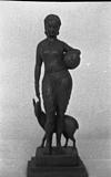 A girl with a water pot-shankuntala-A wooden sculpture