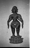 A wooden female figure