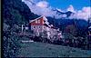 A house on the slope of the Himalayas